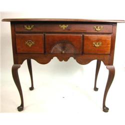 A QUEEN ANNE CARVED CHERRYWOOD DRESSING TABLE