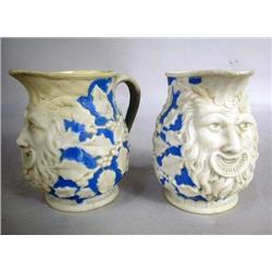 A PAIR OF HANDLED PARIAN CREAM PITCHERS