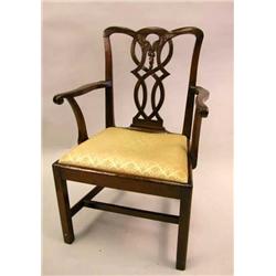 A GEORGE III CARVED MAHOGANY OPEN ARMCHAIR