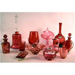 A LARGE GROUP OF CRANBERRY GLASS