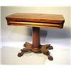 Image 1 : AN CLASSICAL MAHOGANY CARD TABLE RESTING ON PEDESTAL BASE AND CLAW FEET