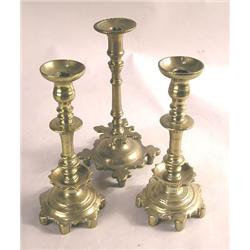 A PAIR OF BRASS CANDLESTICKS