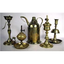 A GROUP OF FIVE BRASS OIL LAMPS