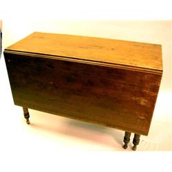 A FEDERAL WALNUT DROP-LEAF SIX LEG TABLE