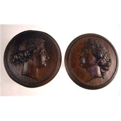 TWO TURNED AND CARVED WOOD TIEBACKS