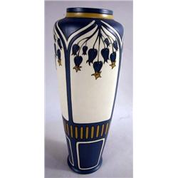 AN ART NOUVEAU FLORAL-DECORATED VASE
