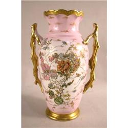 A HAND PAINTED AND PARCEL-GILT TWO HANDLE PORCELAIN VASE