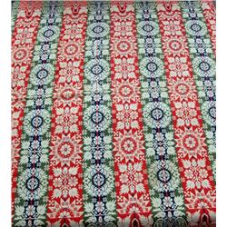A RED, WHITE, BLUE AND GREEN JACQUARD COVERLET