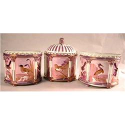 A PAIR OF D-SHAPED PINK LUSTERWARE COVERED CANISTERS