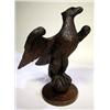 Image 1 : A CARVED OAK EAGLE PERCHED ON SPHERE