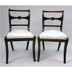 A PAIR OF REGENCY BLACK PAINTED, PARCEL-GILT AND METAL MOUNTED BEECHWOOD SIDE CHAIRS