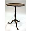 Image 1 : A GEORGE II FIGURED MAHOGANY PIE-CRUST CANDLESTAND
