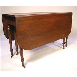 A FEDERAL WALNUT SIX-LEG DROP LEAF TABLE