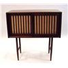 Image 1 : A GEORGE NAKASHIMA WALNUT CABINET ON FOUR LEGS WITH GRASS CLOTH DOORS