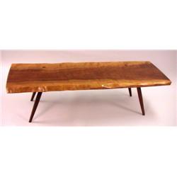 A GEORGE NAKASHIMA CHERRYWOOD COFFEE TABLE/ BENCH ON FOUR LEGS
