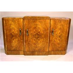 AN ART DECO FIGURED WALNUT SIDEBOARD
