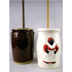 A FIGURAL DECORATED BUTTER CHURN