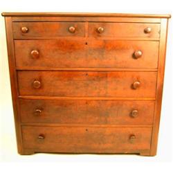 A VICTORIAN FIGURED WALNUT CHEST-OF-DRAWERS