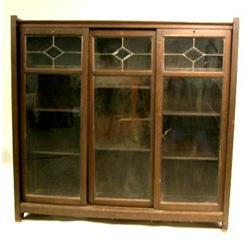 A MISSION STYLE FIGURED OAK BOOKCASE