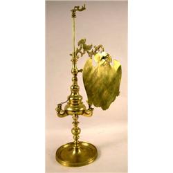 A CAST BRASS SIX LIGHT FLUID LAMP WITH REFLECTING PANEL