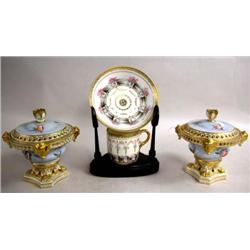 A PAIR OF CONTINENTAL POLYCHROME DECORATED CACHE POTS