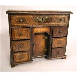 A QUEEN ANNE INLAID WALNUT MINIATURE KNEEHOLE BUREAU