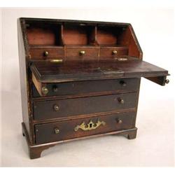 A GEORGE I WALNUT MINIATURE SLANT FRONT DESK