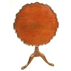 A GEORGE II PIECRUST MAHOGANY TEA TABLE