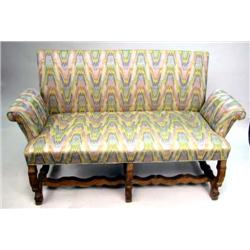 A BAROQUE STYLE OAK SETTEE