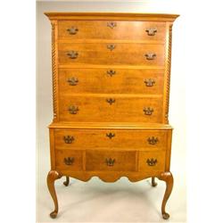 A QUEEN ANNE STYLE FIGURED MAPLE FLAT-TOP HIGH CHEST OF DRAWERS