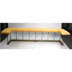 A GEORGIAN STYLE LEATHER-UPHOLSTERED BRASS CLUB FENDER