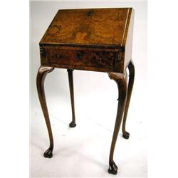 A GEORGE I STYLE WALNUT VENEERED LADIES' WRITING DESK