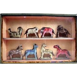 A GROUP OF EIGHT CHINESE FIGURES OF HORSES