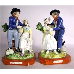 A PAIR OF STAFFORDSHIRE FIGURINES