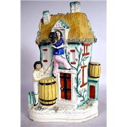A STAFFORDSHIRE FIGURAL