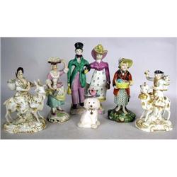 A GROUP OF SIX FIGURINES