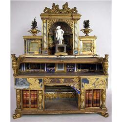 A MINIATURE GILT-METAL MOUNTED CYLINDER FRONT DESK