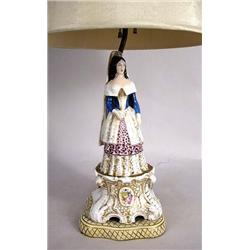 A CONTINENTAL PORCELAIN FIGURAL