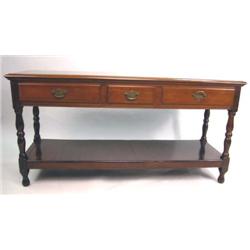 A GEORGE I STYLE WALNUT SERVING TABLE