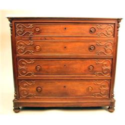 A VICTORIAN MARBLE TOP WALNUT DRESSER