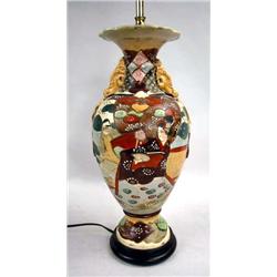 AN ORIENTAL STYLE TABLE LAMP