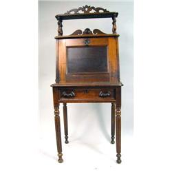 A VICTORIAN CARVED WALNUT AND FIGURED MAPLE SECRETARY