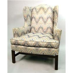 A GEORGE III STYLE EASY CHAIR
