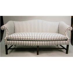 A CHIPPENDALE STYLE CAMELBACK SOFA