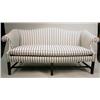 Image 1 : A CHIPPENDALE STYLE CAMELBACK SOFA