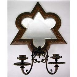 AN ARTS AND CRAFTS PATINATED METAL TWO-LIGHT MIRRORED WALL SCONCE