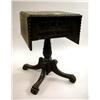 Image 1 : AN EMPIRE STYLE CARVED AND FIGURED MAHOGANY TWO-DRAWER DROP-LEAF WORK TABLE
