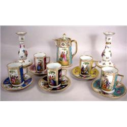 A GROUP OF ASSORTED DRESDEN ENAMEL-DECORATED CUPS AND SAUCERS