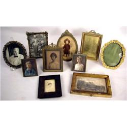 A GROUP OF ASSORTED PICTURES AND PICTURE FRAMES