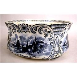 A BLUE AND WHITE DELFT CACHEPOT